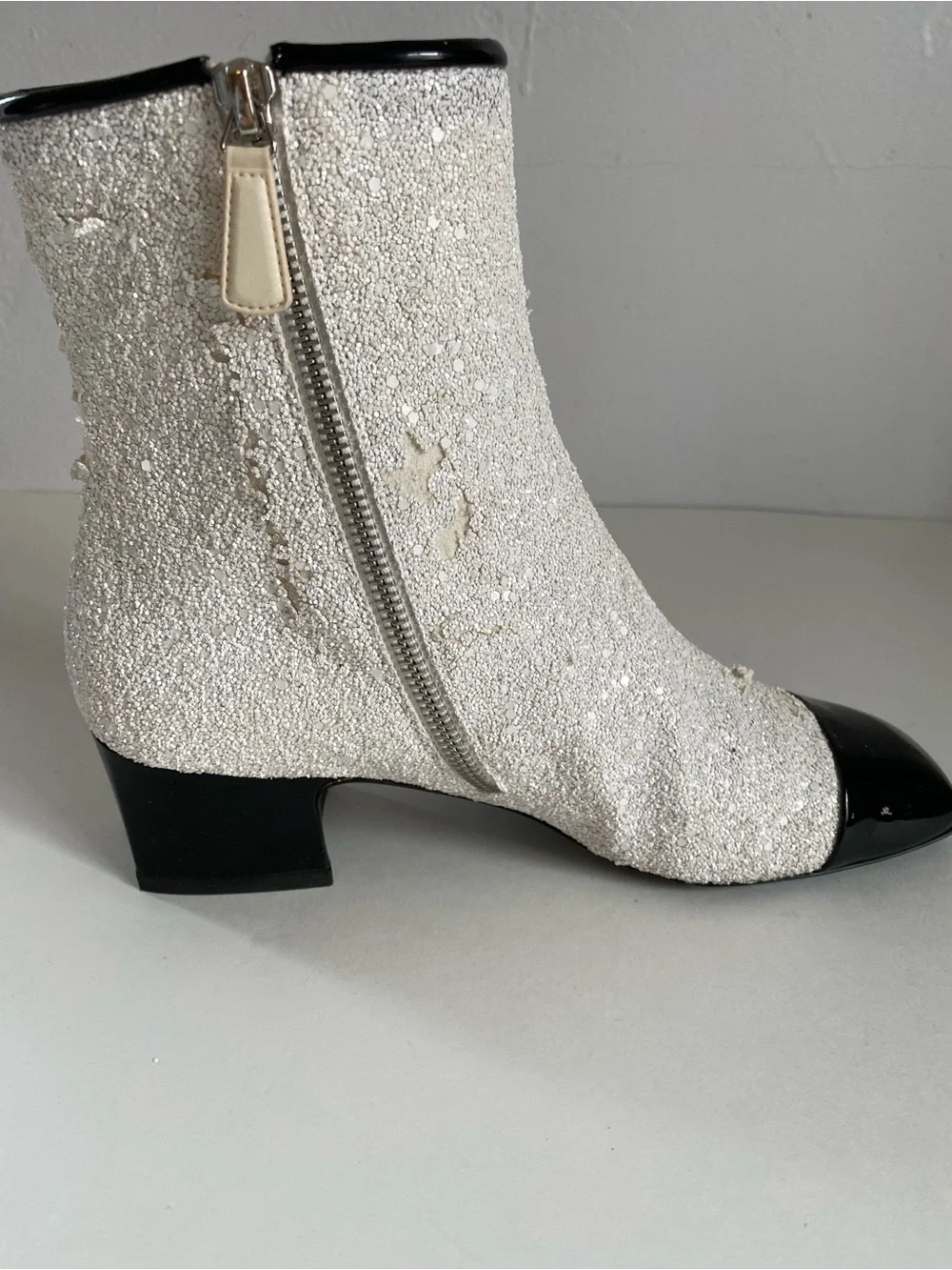 CHANEL White Sequin Ankle Boots with Black Cap Toe. Runway astronaut collection.